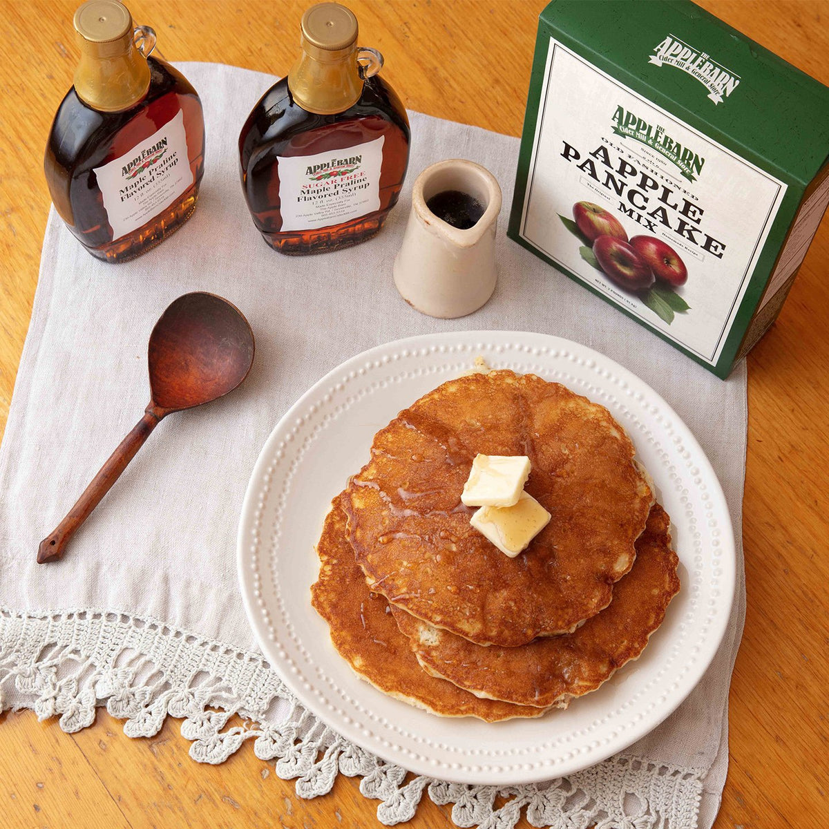 Maple praline flavored syrup on apple pancakes